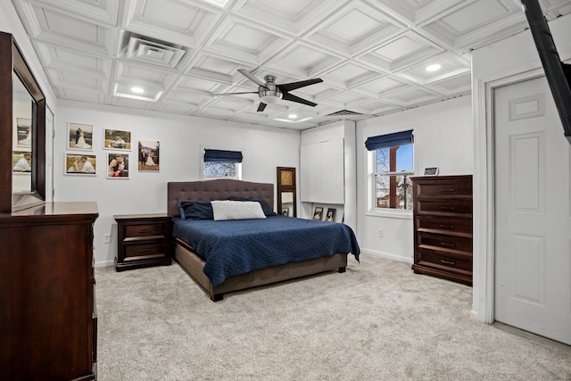 bedroom featuring ceiling fan, light carpet, and coffered ceiling