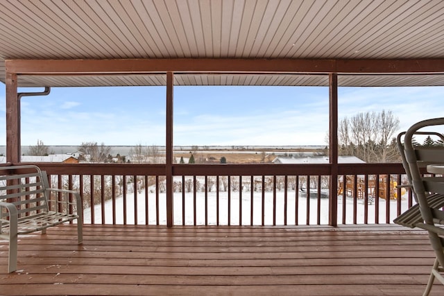 view of snow covered deck