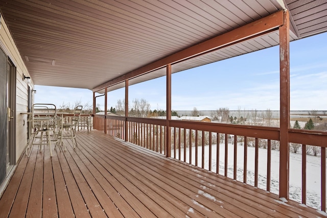 view of snow covered deck