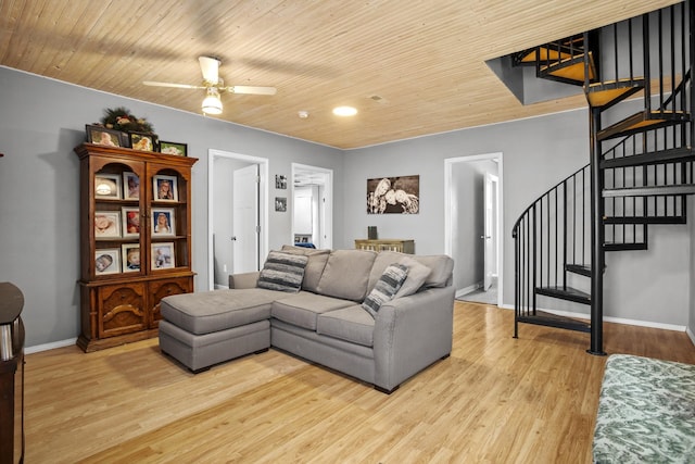 living room featuring ceiling fan, wooden ceiling, and light wood-type flooring