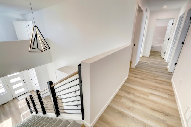 3308 23rd Ave NW, Minot, ND 58703 - hall with light hardwood / wood-style floors