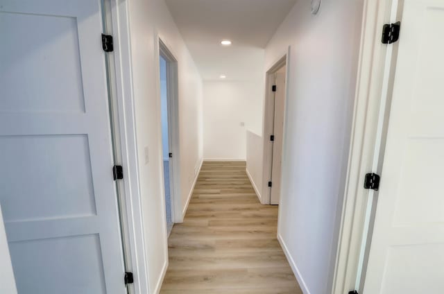3308 23rd Ave NW, Minot, ND 58703 - hallway featuring light hardwood / wood-style floors
