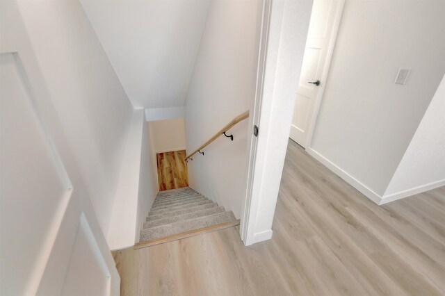 3308 23rd Ave NW, Minot, ND 58703 - staircase with hardwood / wood-style floors