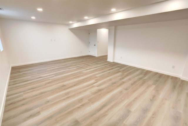 3308 23rd Ave NW, Minot, ND 58703 - basement featuring light hardwood / wood-style floors