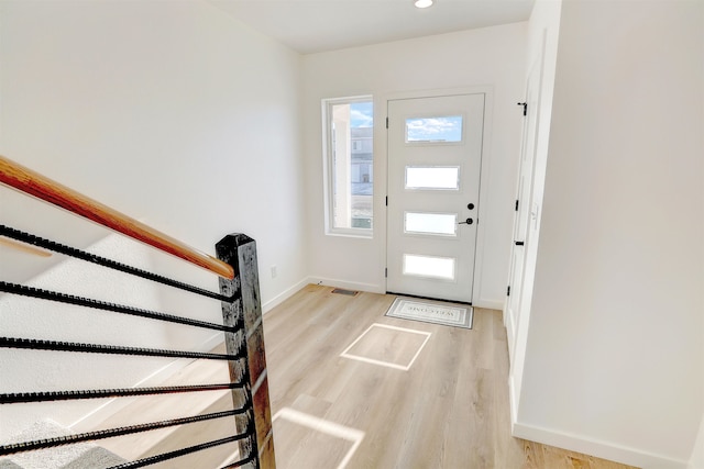 3308 23rd Ave NW, Minot, ND 58703 - foyer entrance featuring light wood-type flooring