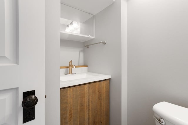 423 1st Ave, Kenmare, ND 58746 - bathroom featuring vanity and toilet