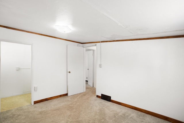 107 3rd St, Granville, ND 58741 - interior space featuring light carpet and crown molding