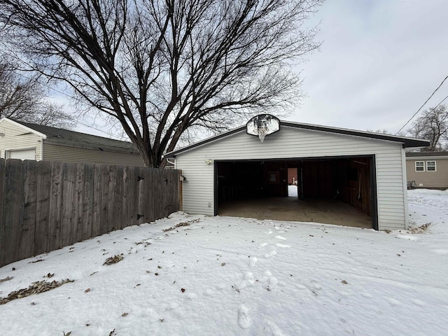 view of snow covered garage