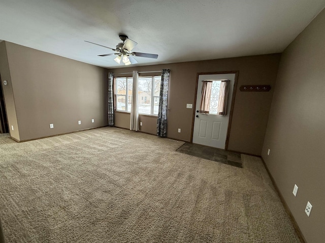 interior space featuring ceiling fan