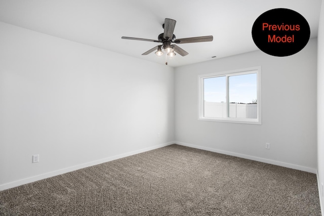 carpeted spare room with ceiling fan