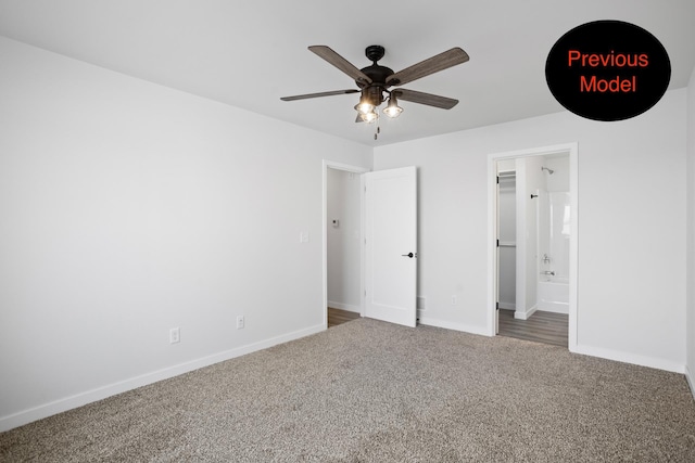 unfurnished bedroom with carpet flooring, ensuite bathroom, and ceiling fan