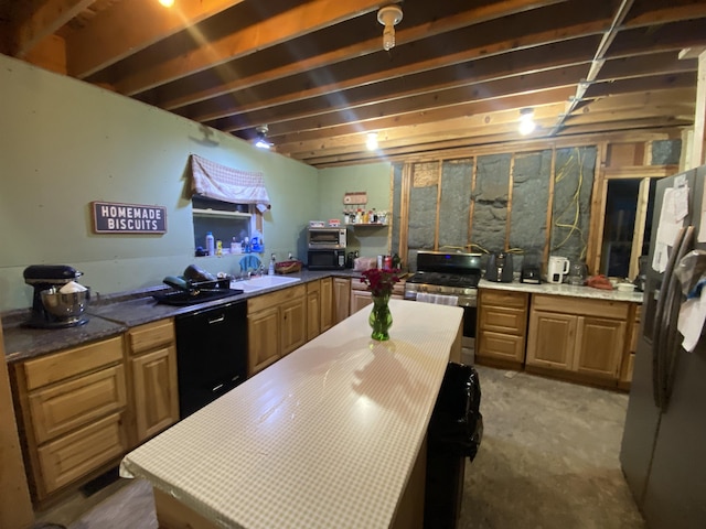 kitchen with concrete flooring, stainless steel appliances, and sink