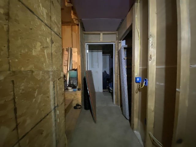 hallway featuring concrete flooring