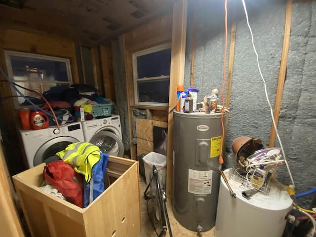 utility room featuring washing machine and clothes dryer and water heater