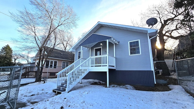 view of snow covered house