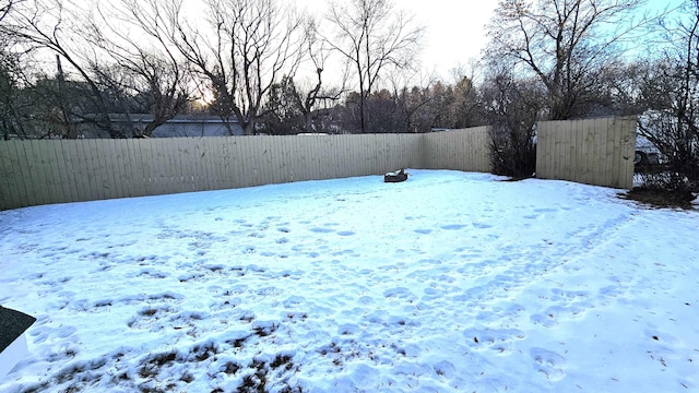 view of yard covered in snow