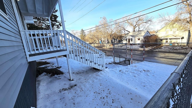 view of yard covered in snow