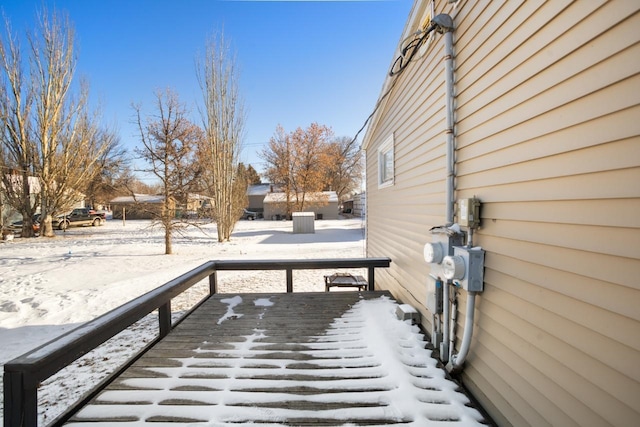 view of snow covered deck