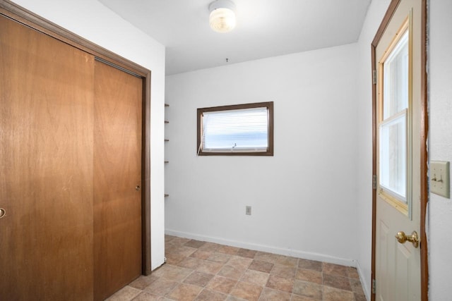 unfurnished bedroom featuring a closet