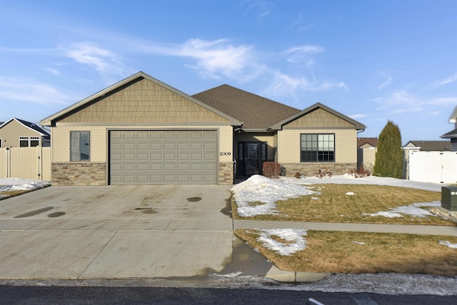 single story home featuring a garage