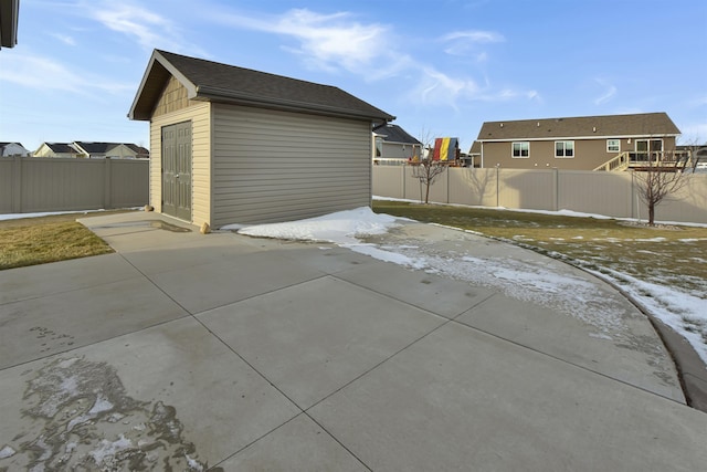 exterior space with a shed