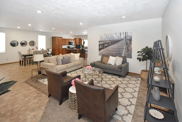 living room with a textured ceiling