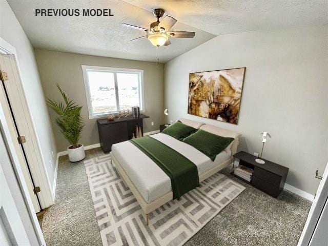 carpeted bedroom featuring ceiling fan, lofted ceiling, and a textured ceiling