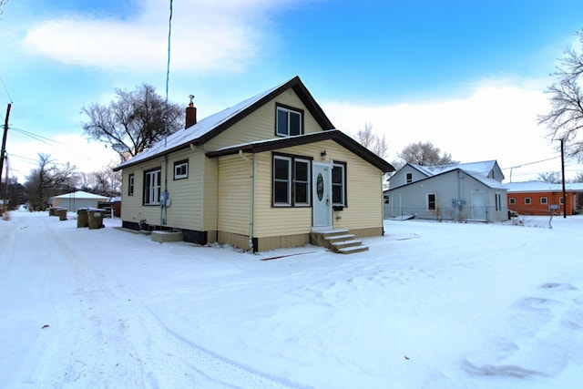 view of snow covered property