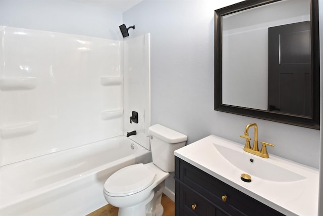 full bathroom with bathing tub / shower combination, vanity, and toilet