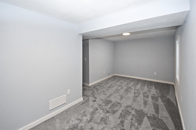 unfurnished room featuring carpet floors