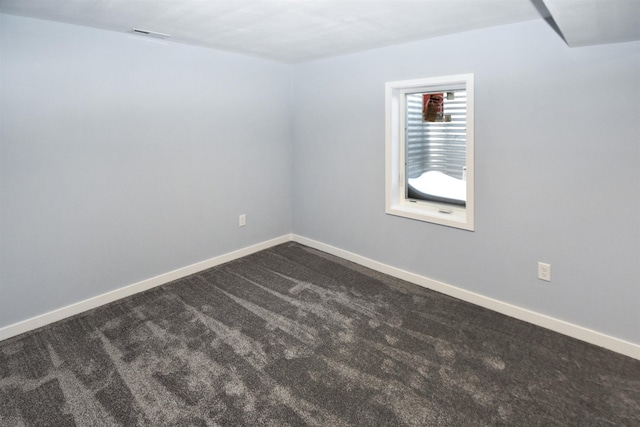 unfurnished room featuring carpet floors