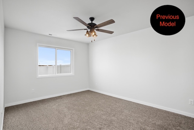 carpeted empty room featuring ceiling fan