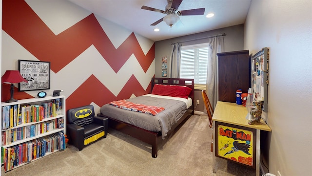 carpeted bedroom featuring ceiling fan