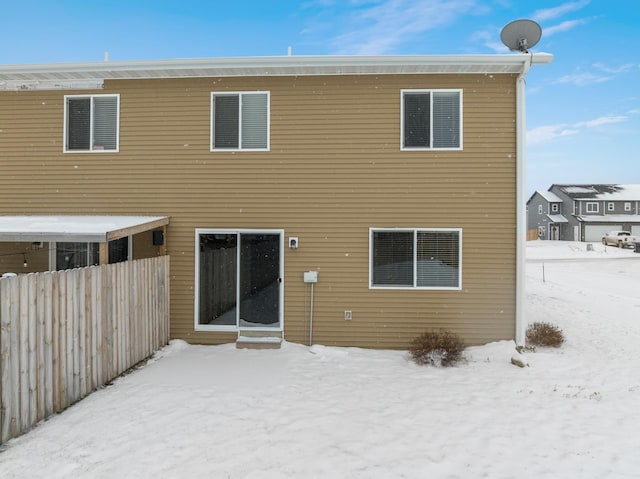 view of snow covered property