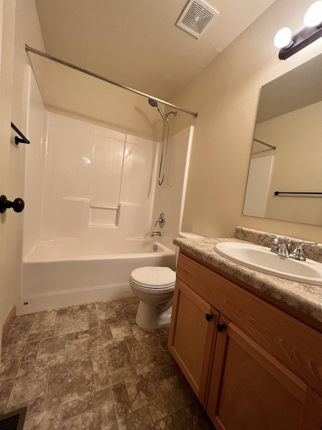 full bathroom featuring vanity, toilet, and tub / shower combination