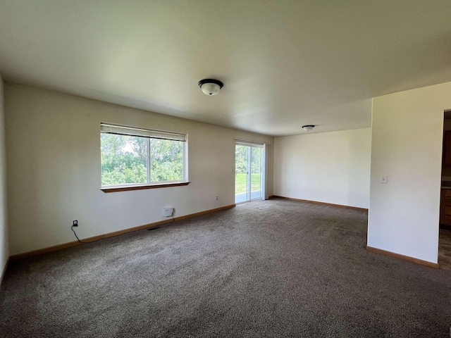 view of carpeted spare room