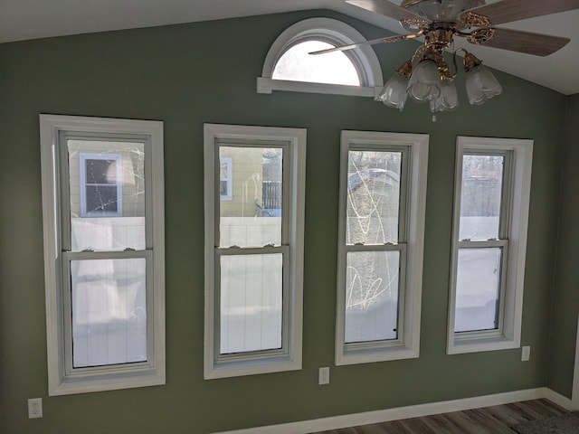 entryway featuring hardwood / wood-style floors, plenty of natural light, lofted ceiling, and ceiling fan