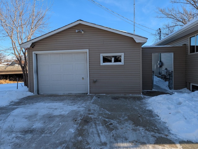 view of snow covered garage