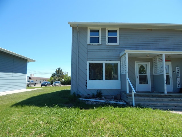 view of front of house with a front lawn