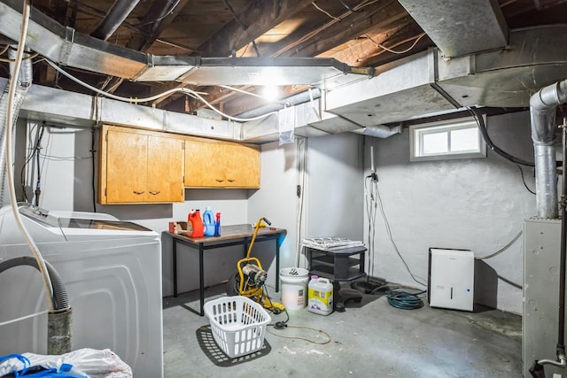 basement featuring washing machine and dryer