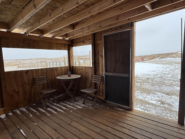 view of snow covered deck