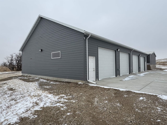 view of snow covered garage