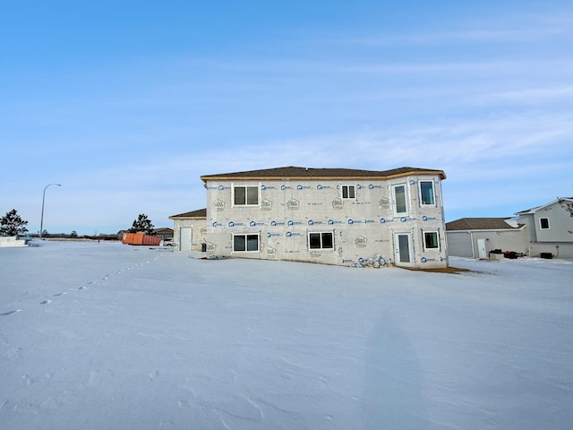 view of snow covered property