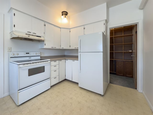 kitchen featuring white cabinetry and white appliances