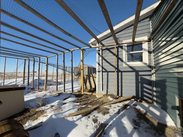 view of snow covered patio