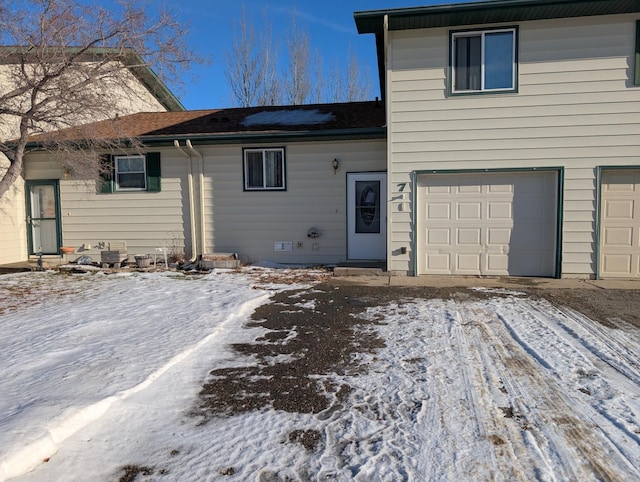 view of front of house with a garage