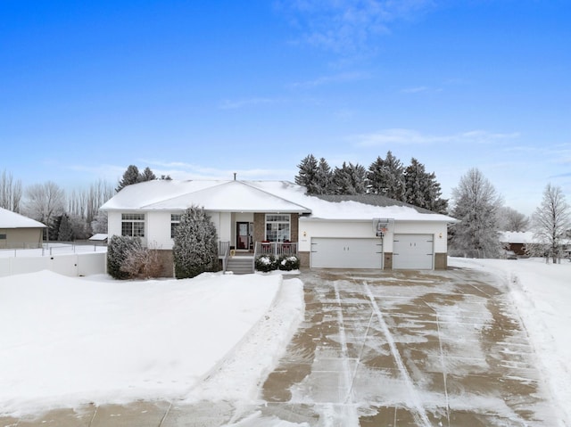 single story home featuring a garage