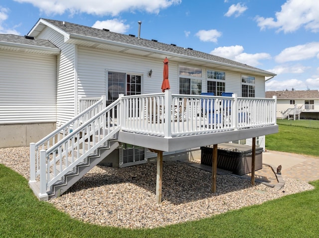 back of house featuring a deck