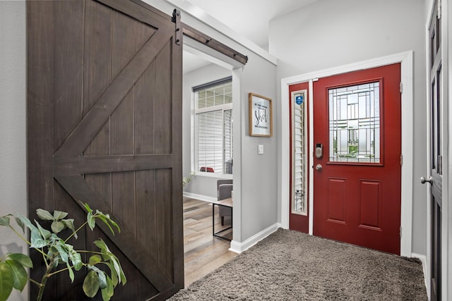 entrance foyer featuring a barn door