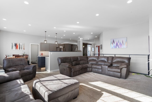 living room featuring light carpet